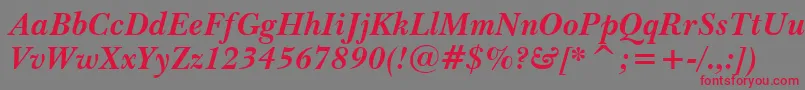 BaskervilleWin95btBoldItalic-fontti – punaiset fontit harmaalla taustalla