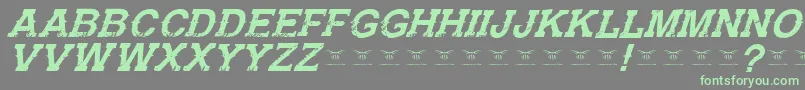 フォントGunfighteracademyItalic – 灰色の背景に緑のフォント