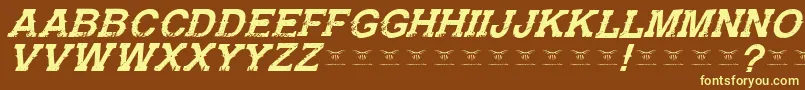 GunfighteracademyItalic-Schriftart – Gelbe Schriften auf braunem Hintergrund