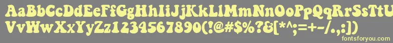 Keepontruckin Font – Yellow Fonts on Gray Background