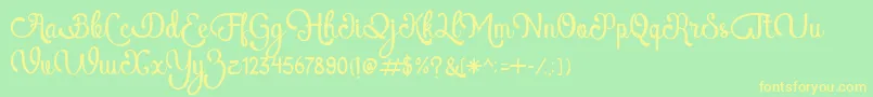 AtlantisHeartFree-Schriftart – Gelbe Schriften auf grünem Hintergrund