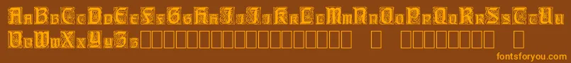 フォントCarrickCapitals – オレンジ色の文字が茶色の背景にあります。