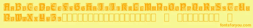 フォントCarrickCapitals – オレンジの文字が黄色の背景にあります。