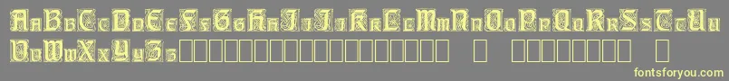 CarrickCapitals-Schriftart – Gelbe Schriften auf grauem Hintergrund
