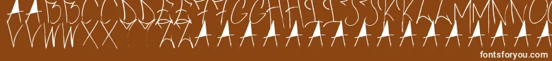 Шрифт BrushOfAnarchy – белые шрифты на коричневом фоне
