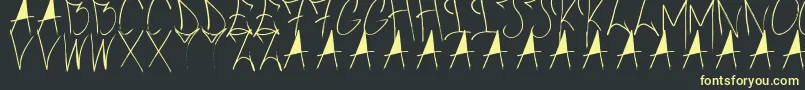 BrushOfAnarchy Font – Yellow Fonts on Black Background