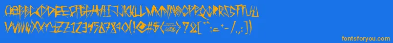 フォントTribalThreat – オレンジ色の文字が青い背景にあります。