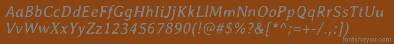 AveriaItalic-Schriftart – Graue Schriften auf braunem Hintergrund