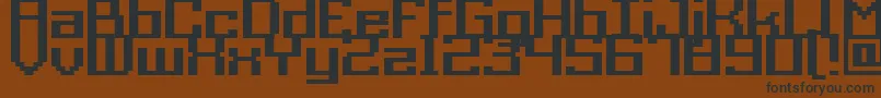 Więcej informacji o czcionce GrixelAcme9RegularBold Czcionka GrixelAcme9RegularBold – czarne czcionki na brązowym tle