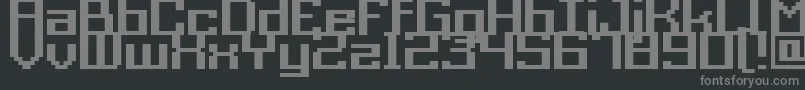 Czcionka GrixelAcme9RegularBold – szare czcionki na czarnym tle