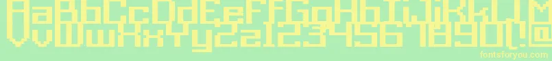 GrixelAcme9RegularBold-fontti – keltaiset fontit vihreällä taustalla
