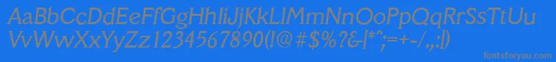 フォントVeracruzserialItalic – 青い背景に灰色の文字