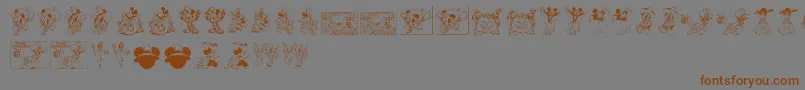 フォントDisneyHalloween – 茶色の文字が灰色の背景にあります。