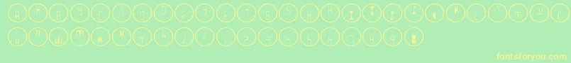 Q Font – Yellow Fonts on Green Background