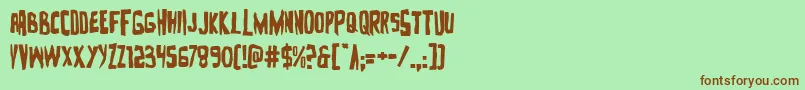 Zakenstein Font – Brown Fonts on Green Background