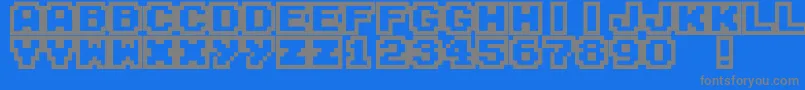 M04-fontti – harmaat kirjasimet sinisellä taustalla