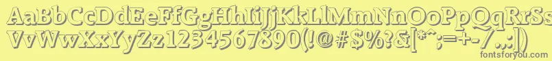 RaleighshadowBold-fontti – harmaat kirjasimet keltaisella taustalla