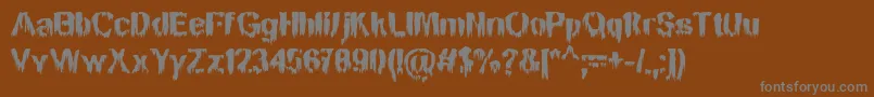 MansonNights-Schriftart – Graue Schriften auf braunem Hintergrund