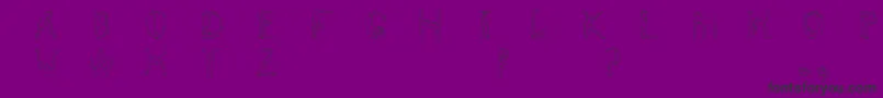 Humancap Font – Black Fonts on Purple Background