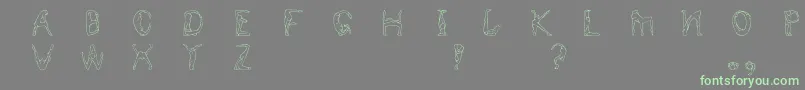 Humancap Font – Green Fonts on Gray Background
