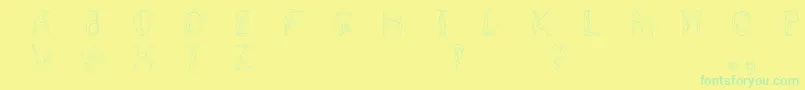 Humancap Font – Green Fonts on Yellow Background