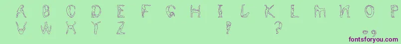 Humancap Font – Purple Fonts on Green Background