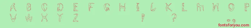 Humancap Font – Red Fonts on Green Background