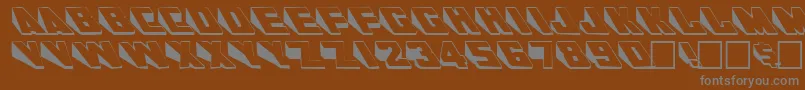 WedgieRegular-fontti – harmaat kirjasimet ruskealla taustalla
