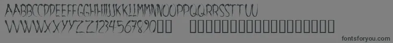 Aracnoide-Schriftart – Schwarze Schriften auf grauem Hintergrund