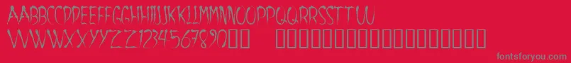 Aracnoide-Schriftart – Graue Schriften auf rotem Hintergrund