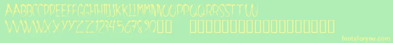 Aracnoide Font – Yellow Fonts on Green Background