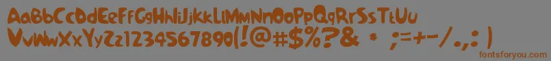 フォントSamba – 茶色の文字が灰色の背景にあります。