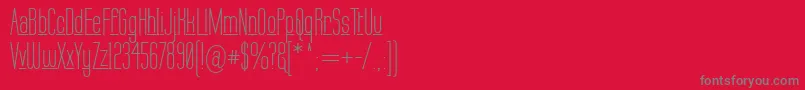 フォントLabtopUnderscore – 赤い背景に灰色の文字