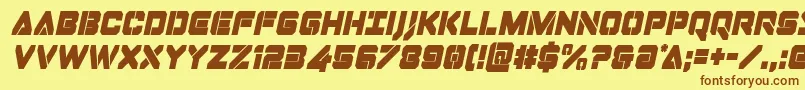 フォントDominojackcondital – 茶色の文字が黄色の背景にあります。