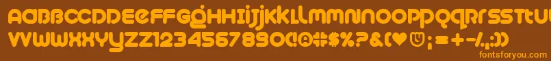 フォントPlush – オレンジ色の文字が茶色の背景にあります。