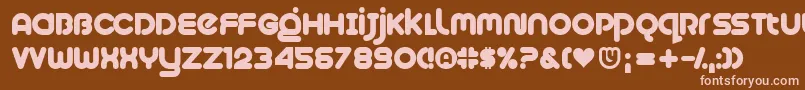 Plush-fontti – vaaleanpunaiset fontit ruskealla taustalla