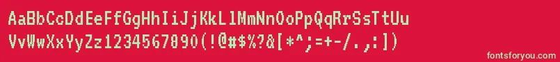Vt323Regular-Schriftart – Grüne Schriften auf rotem Hintergrund