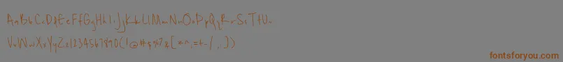 Unrulyness-Schriftart – Braune Schriften auf grauem Hintergrund