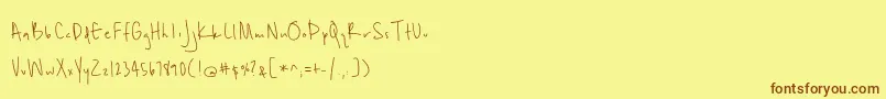 Unrulyness Font – Brown Fonts on Yellow Background