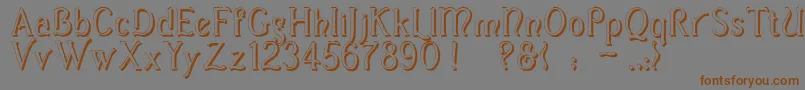 フォントCasuaShadow – 茶色の文字が灰色の背景にあります。