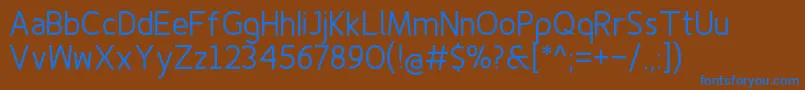 Czcionka Finenessproregular – niebieskie czcionki na brązowym tle
