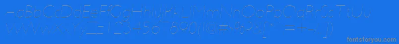 UltimapdabHairlineitalic-Schriftart – Graue Schriften auf blauem Hintergrund