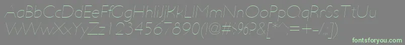 フォントUltimapdabHairlineitalic – 灰色の背景に緑のフォント