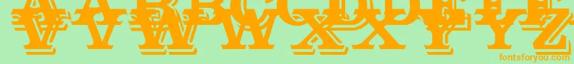 Outstanding-fontti – oranssit fontit vihreällä taustalla
