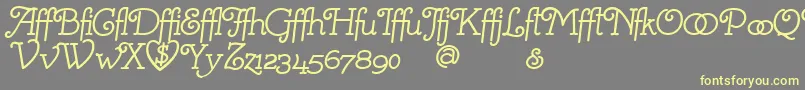 Mistresa Font – Yellow Fonts on Gray Background
