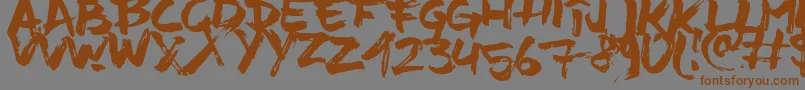 TimeMachino Font – Brown Fonts on Gray Background