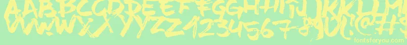 フォントTimeMachino – 黄色の文字が緑の背景にあります