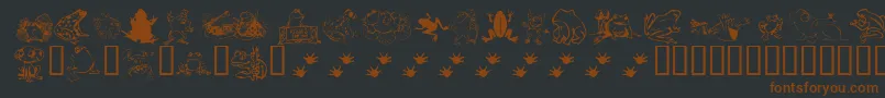 フォントKrFrogsForJennifer – 黒い背景に茶色のフォント