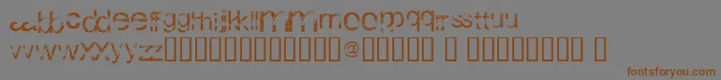 WackyArial-Schriftart – Braune Schriften auf grauem Hintergrund