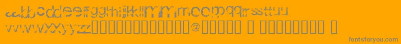 WackyArial-fontti – harmaat kirjasimet oranssilla taustalla